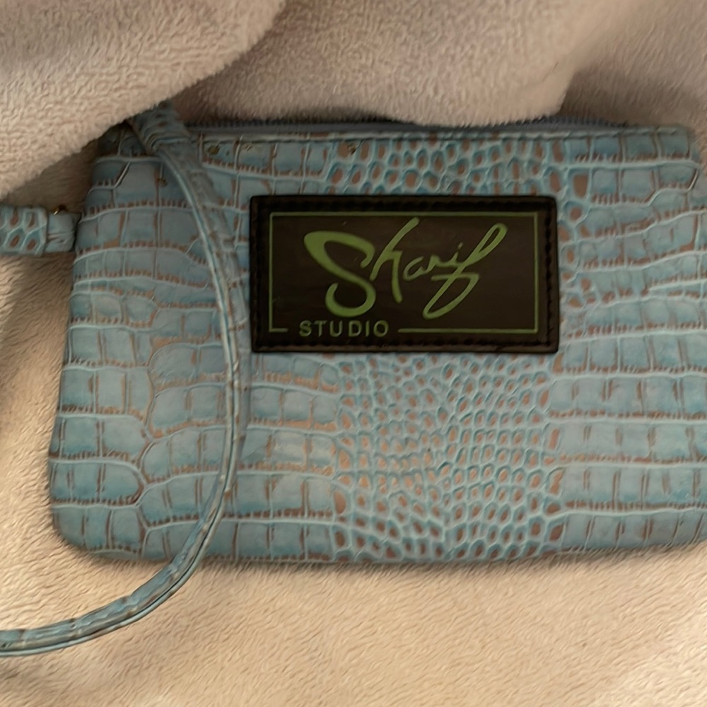 Sharif studio blue  with leopard interior